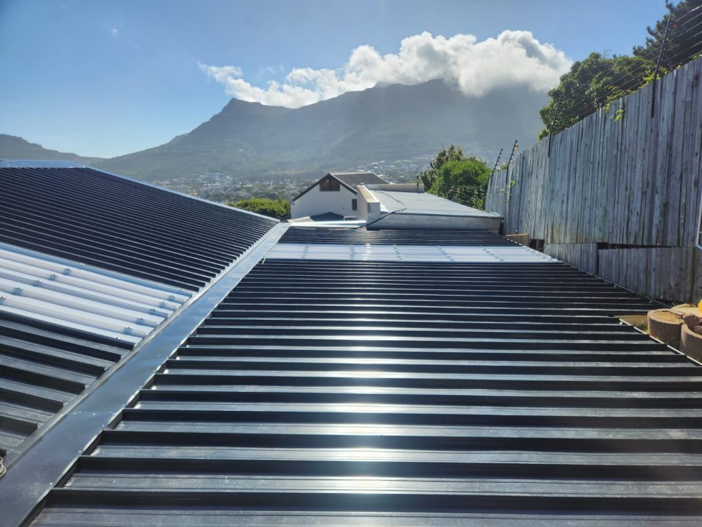 Sheet roofing installation by Peninsula Roofing